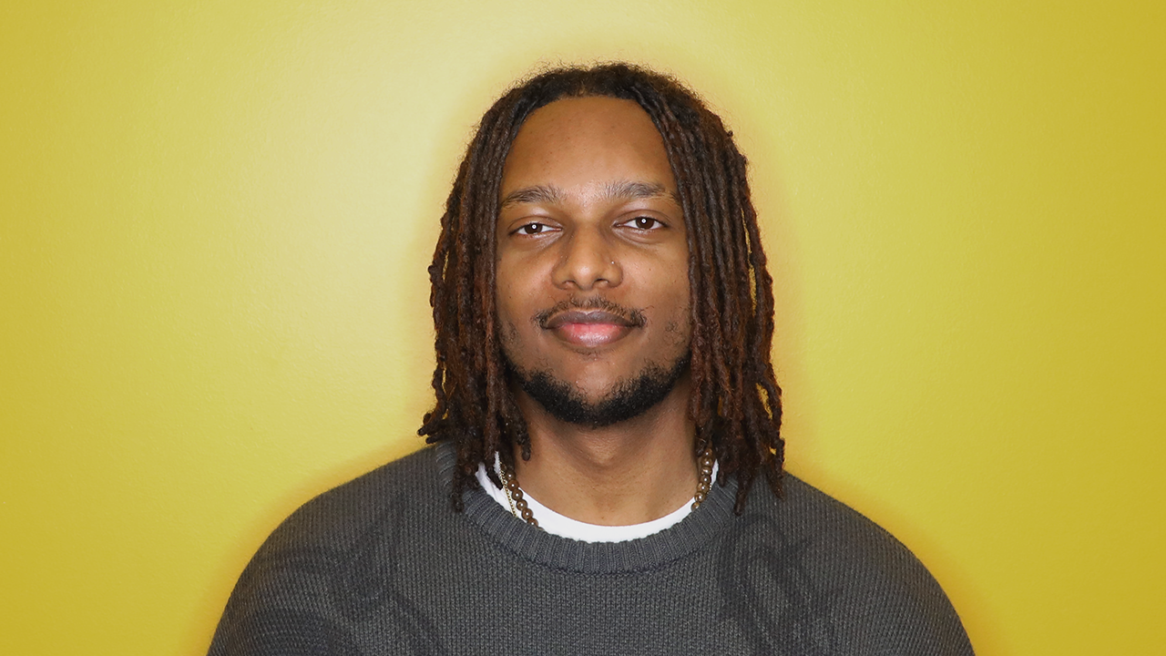 Close-up of IEI's Finance & Operations Intern Nathan Yilma.