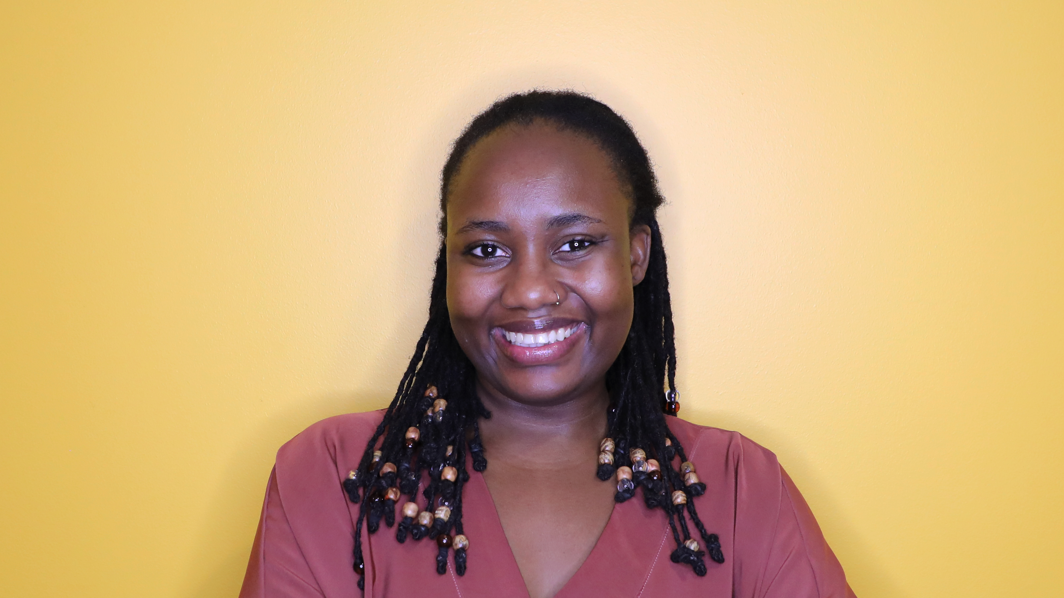 Close-up of IEI's Community Initiatives Program Specialist Madeline Kujabi.
